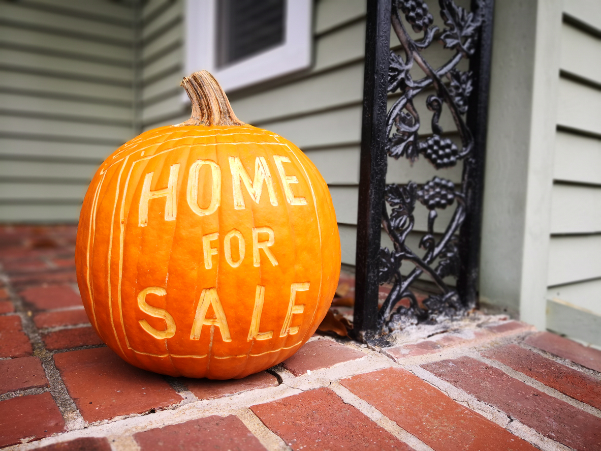 home for sale carved into a pumpkin